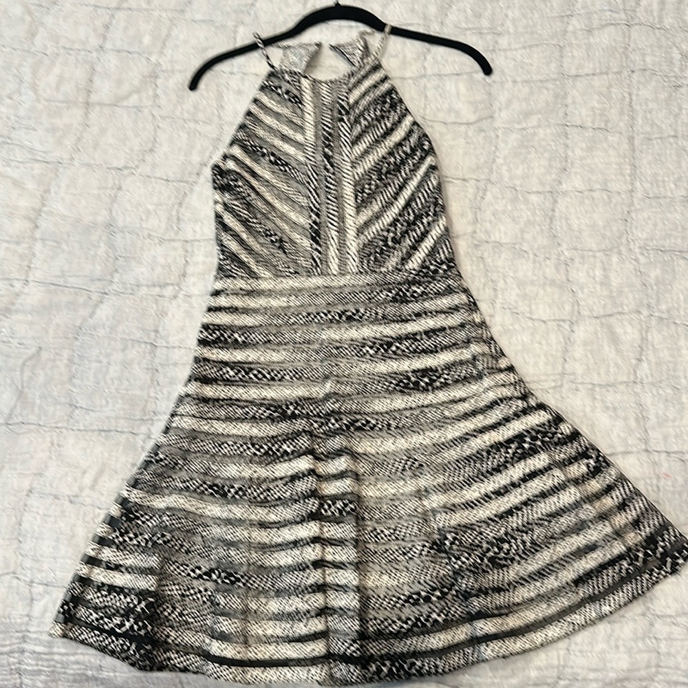 New with tags Parker fit and flair style dress.  Size XS.